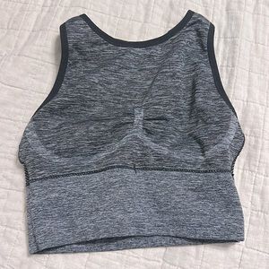 High neck midi sports bra. Size small. No pads.